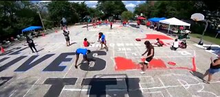 Breonna Taylor mural painted on basketball court