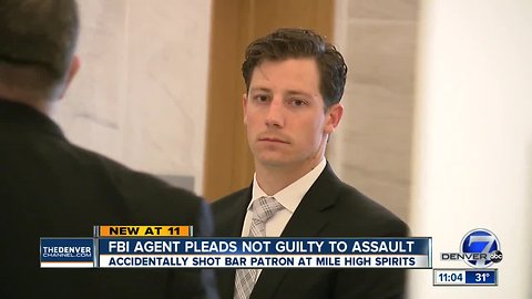 Dancing FBI agent accused of accidentally shooting Denver man pleads not guilty