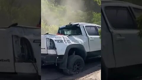 Dodge Ram TRX getting towed off the beach after crash