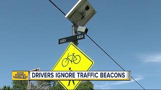 Stop your car, save a cyclist: Don’t ignore flashing yellow “beacons”