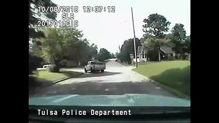 Dash cam shows pursuit of suspect through neighborhood