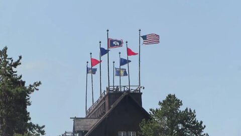 Flags atop the Old Faithful Inn