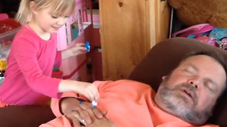 Cute Girl Puts Nail Polish On Her Dad’s Fingers