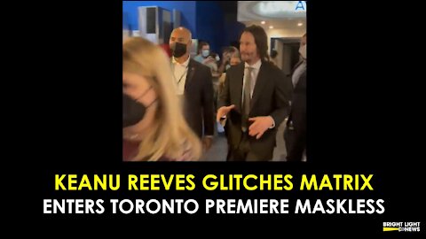 KEANU REEVES GLITCHES MATRIX & ENTERS TORONTO PREMIERE MASKLESS