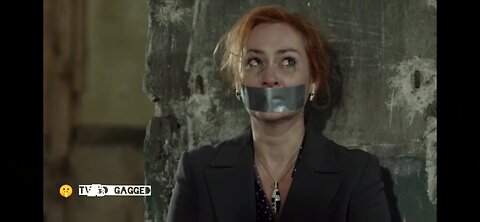 Russian redhead milf with her mouth taped