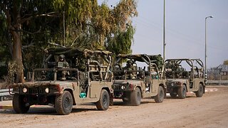 Israeli troops assemble on Gaza border for possible ground assault