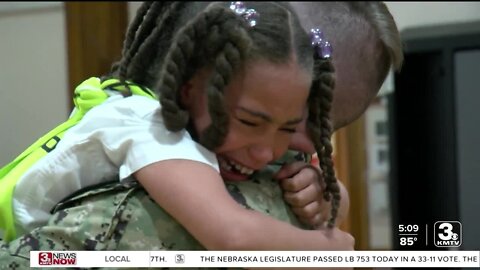 Omaha third-grader surprised by dad after year of deployment