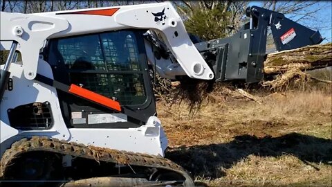 Bobcat T650 Friday action Moving LOGS & gravel clean up