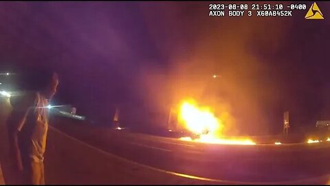 Body cam shows Police pull truck driver from 18 wheeler before it is engulfed in flames
