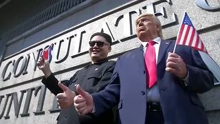 Trump and Kim Jong-un impersonators kiss and make up in Hong Kong