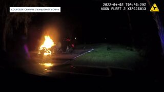 Deputies pull man from car fire