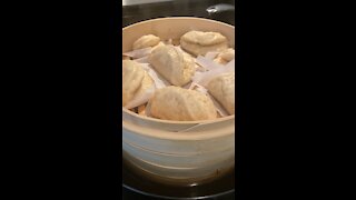 Steaming homemade bao buns