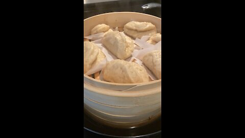 Steaming homemade bao buns