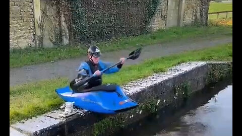 Kayaker Flips Across Canal!