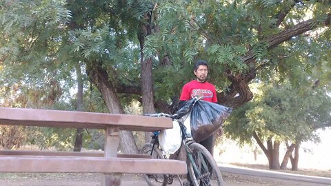 Carlos the thief stealing a bike at the American River Bike Trail as normal in the morning