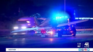 Man arrested after plane lands on Interstate 70