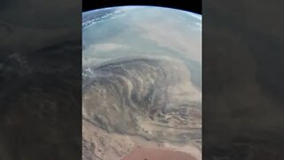 Earth from The Orbit With Clouds