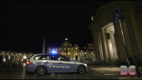 Car rushes Vatican gate, fired on
