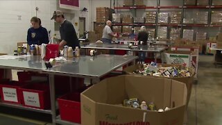 Demand is down at food banks, but support is still needed