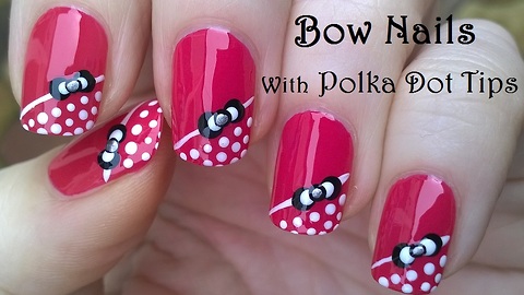 Pretty bow nail art design with dot nail tips