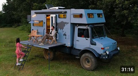 Camping in Unimog caravan with Alkovan and Balcony #