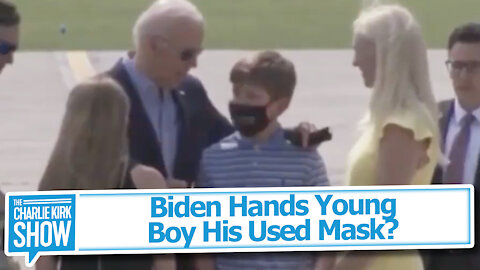Biden Hands Young Boy His Used Mask?
