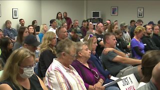 Manitowoc community members protest school district's mask mandate before heated board meeting