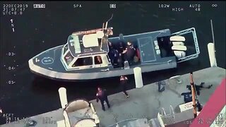 BPD officers rescue dog from freezing water at Inner Harbor