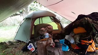 moving the tent under the tarp. Dartmoor Sep 2022