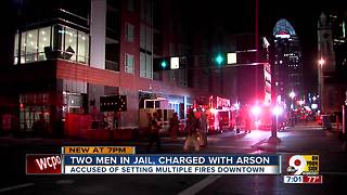 Two men charged with arson