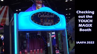 Carnival Cups Crane & SpaceWarp 66 Linked At The Touch Magix IAAPA 2022 Booth