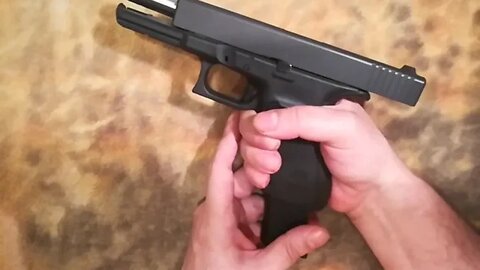 combat handgun - the problem of dropping slide on a empty chamber