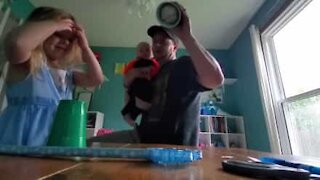 Girl is impressed by dad's magic trick