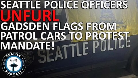 Seattle Police Officers Unfurl Gadsden Flags From Patrol Cars to Protest Vaccine Mandate