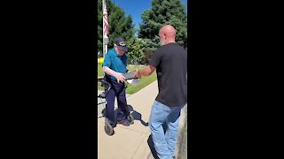 Veteran gives fellow veteran an encased flag for his 99th birthday