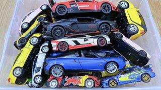 Box full of diecast Cars shown