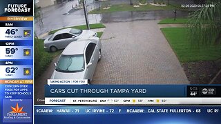 Cars cut through Tampa yard
