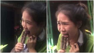 Girl cries after getting tongue stuck on a popsicle