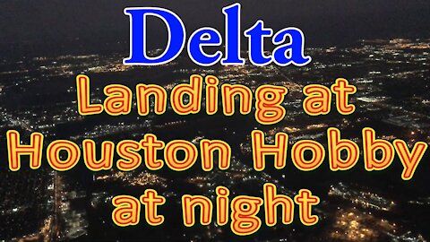 Delta flight landing at Houston Hobby at night