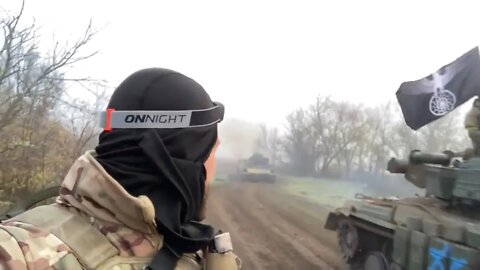 Ukraine war : Ukrainian tank flying a reichsadler on a black sun flag