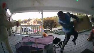 Delivery man scared by Halloween decor