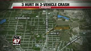 Three hurt in three-vehicle crash in Lansing