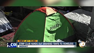 Strip club hands out branded tents to homeless