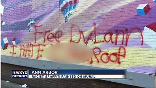 Racist graffiti painted on mural in Ann Arbor