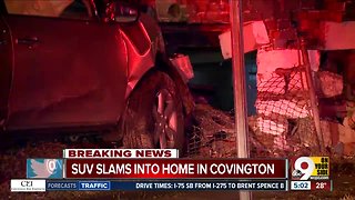 Driver crashes into Covington home