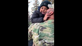 Military dad surprises his son playing at the park