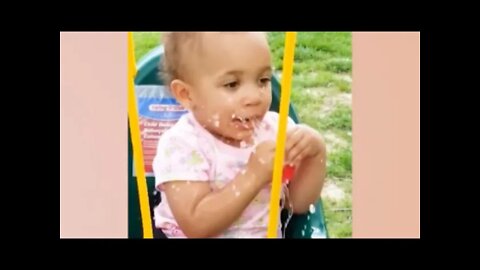 funny baby reaction playing water balloon try not to laugh