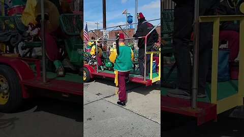 Listening to the Shriners Band Practicing Before the St. Patrick's Day Parade Starts