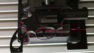 lining up a revolver for laser engraving