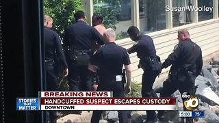 Handcuffed suspect escapes custody downtown